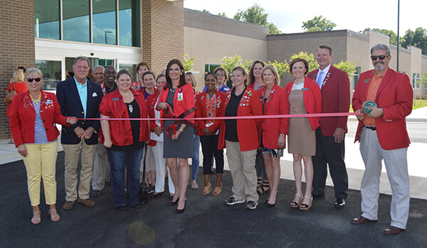 Red Coat ribbon cutting at Spire